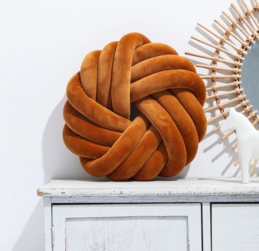 Coussin rond à noeud